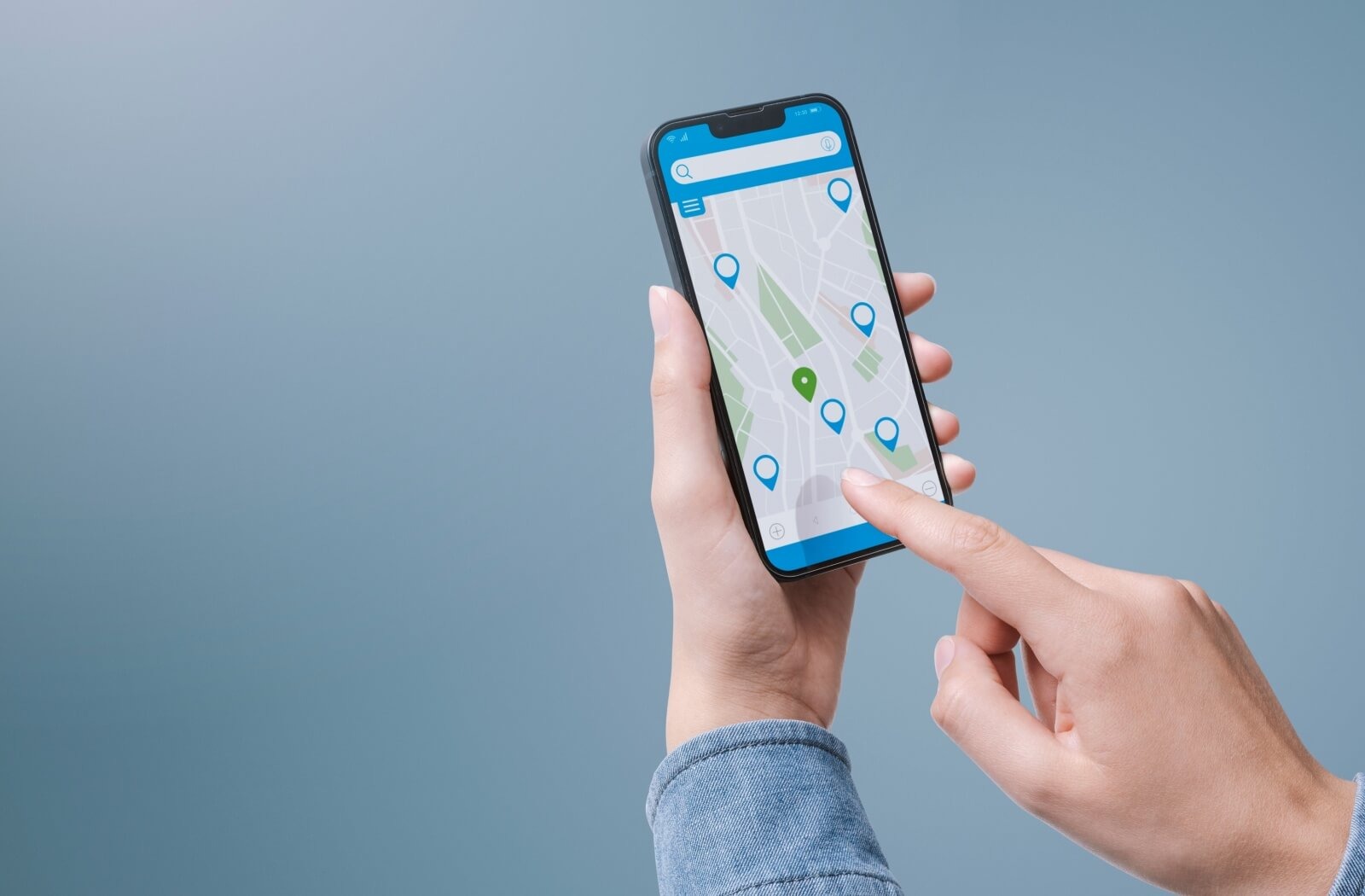 An adult uses a map application on their smartphone and sees the locations of assisted living communities near their family.
