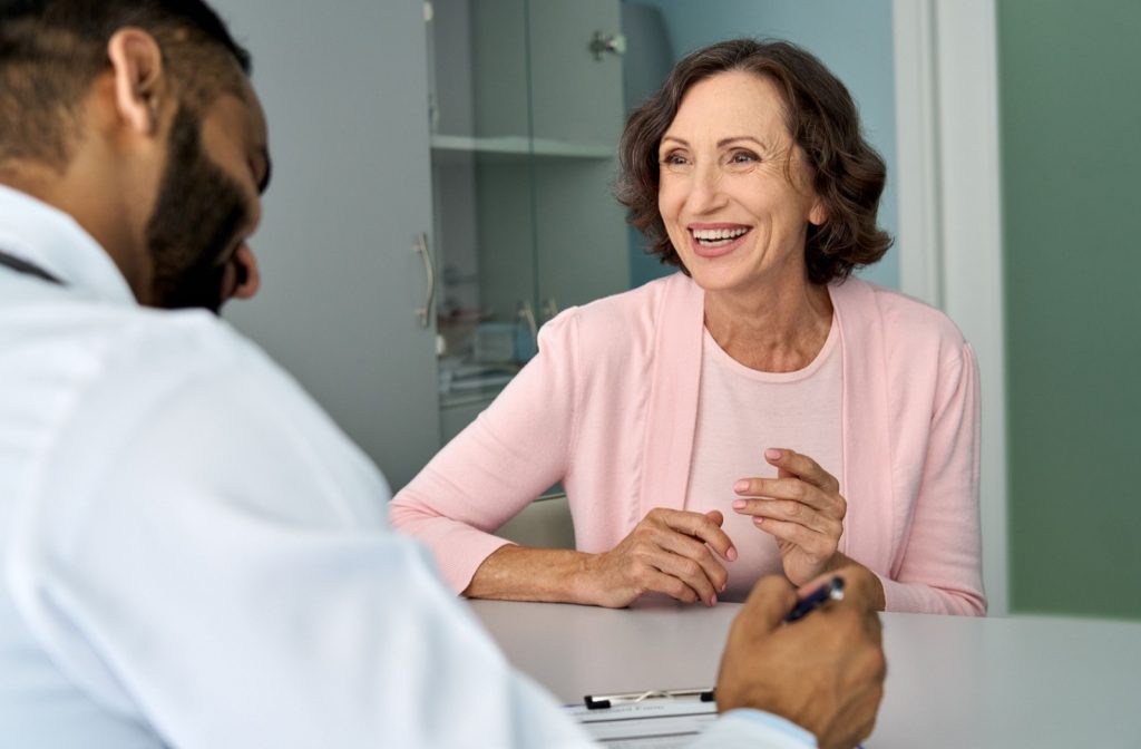 A senior practices word recall exercises with a caregiver.